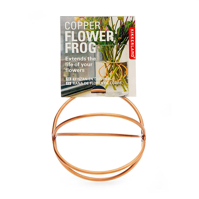 Copper flower frog with Kikkerland packaging on a white background