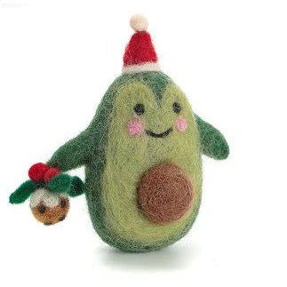 Felted avocado toy with a face, red hat, and holly leaves on a white background