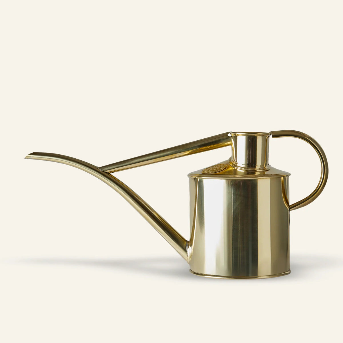 Haws Brass watering can on a white background