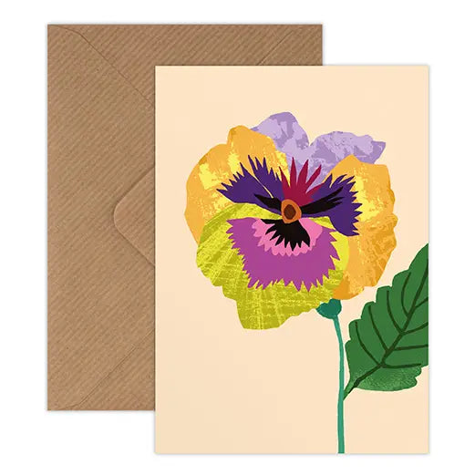 Card with a colorful flower design on a beige background, featuring a brown envelope.
