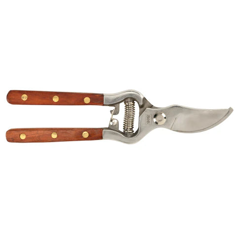 A pair of pruning shears with brown wooden handles secured by brass rivets, and a polished stainless steel blade, shown against a plain white background.