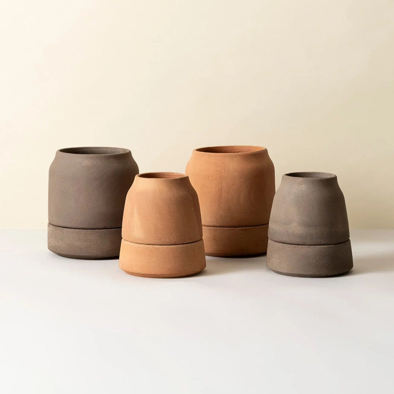 Bergs Potter Viva self-watering terracotta pots in Rosa and Grey, available in 12cm and 14cm sizes