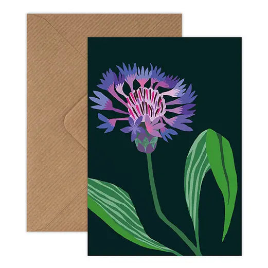 Greeting card with a purple flower design on a dark green background, featuring a brown envelope.