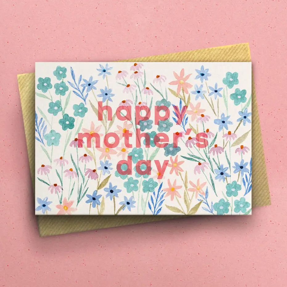 Greeting card with 'Happy Mother's Day' text and floral design on a pink background